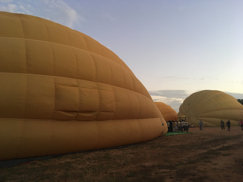 Inflating the balloons with cold air