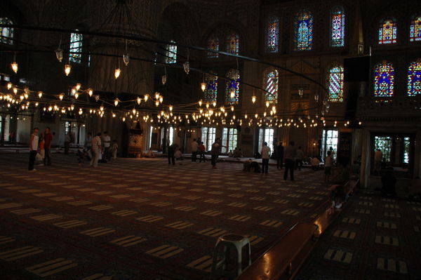men praying in the Blue Mosque