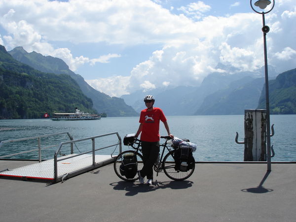 On pier with steamship and Urnersee arm of Viewwaldstaettersee behind