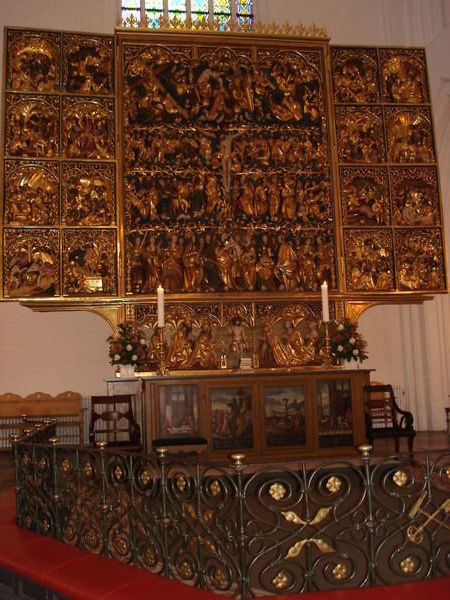 The carved altarpiece dating from the 1500's is as they say magnificient