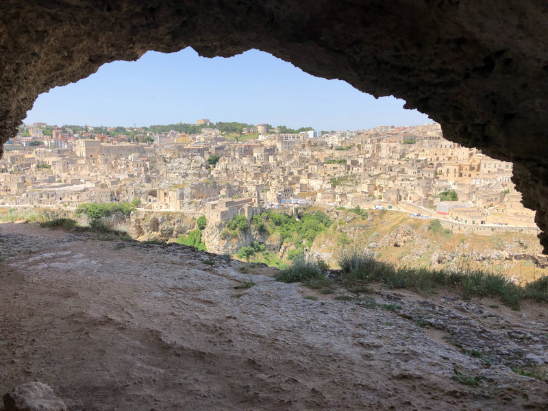 view of Sassi, Matera from a cave across the river 