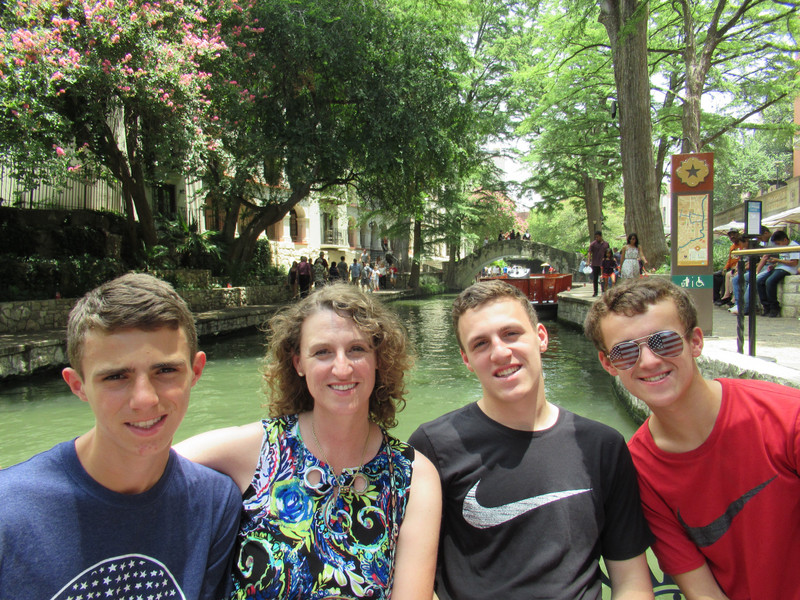 riding the boats on the River Walk