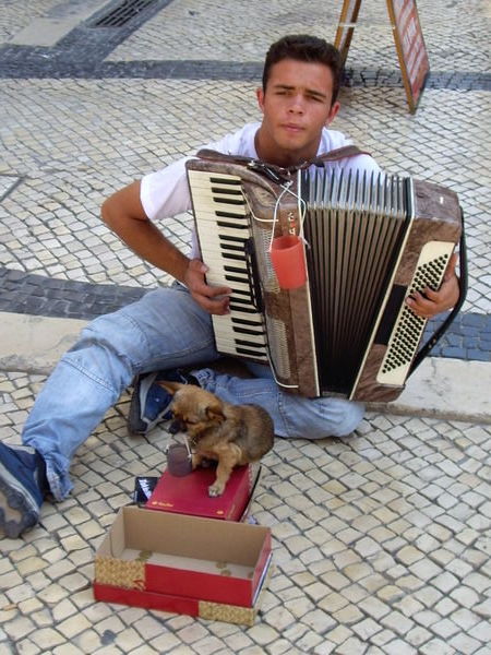 Busker with very cute dog
