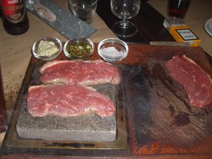 A hot rock and raw steak