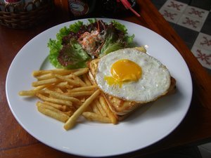 A croque monsieur with a fried egg on top