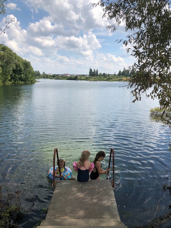 the kids take a dip in the lake