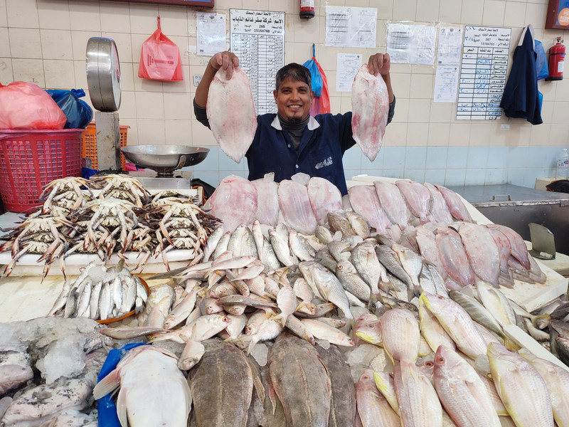 Friendly people at the fish market...