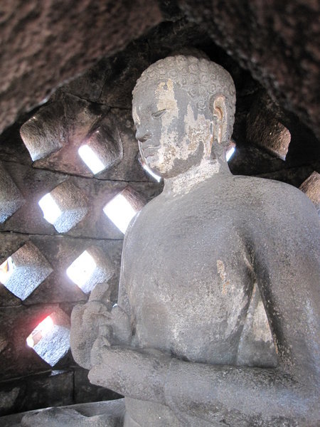 Borobudur, Buddha in a stuppa...