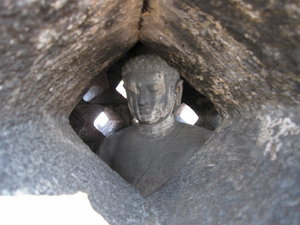 a buddha inside a stuppa