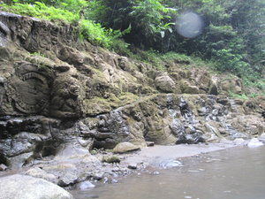carvings on the side of Ayung River