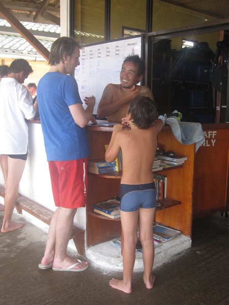 Leslie filing his logbook after his first dive.