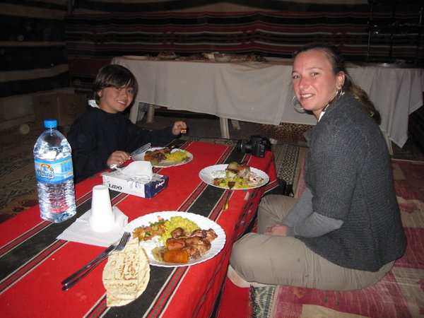 enjoying dinner, bedouin style