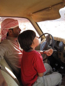 well....tis is the desert...Leslie taking his first driving lesson!