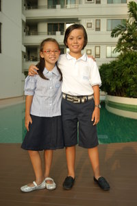Tiffany and Leslie with their new school uniforms!