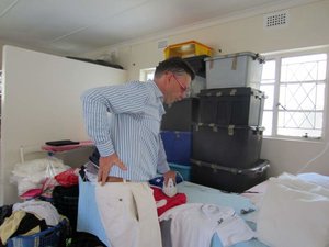 Fitting for uniforms in the morning, so I'm ironing the name tags in the laundry room at school...and it was a hot day! Multi-tasking Dad!