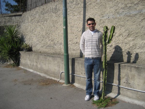 Anthony posing with the aforementioned cactus!