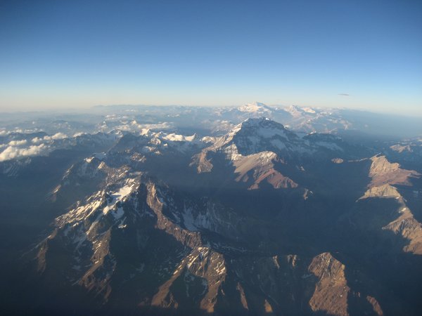 Flying over the Andes at Sunset, Chile.
