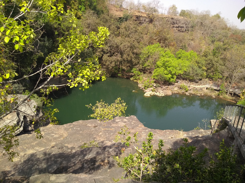 The serene beauty of the pool in the Pandav Falls