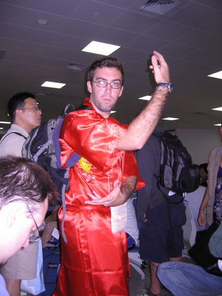 Eric in his robe in the airport