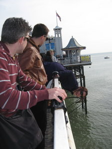 Mari dangles on the Brighton Pier
