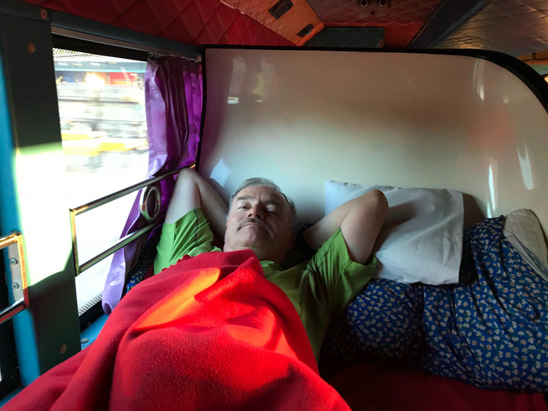Ian relaxes on sleeping bus 