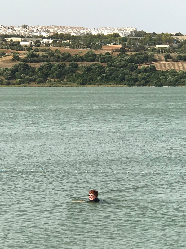 Swimming in Arco de la Frontera lake 