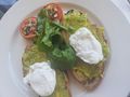 Avocado on bread with poached egg