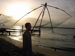 Me and the sunset at Chinese fishing nets at Fort Cochin