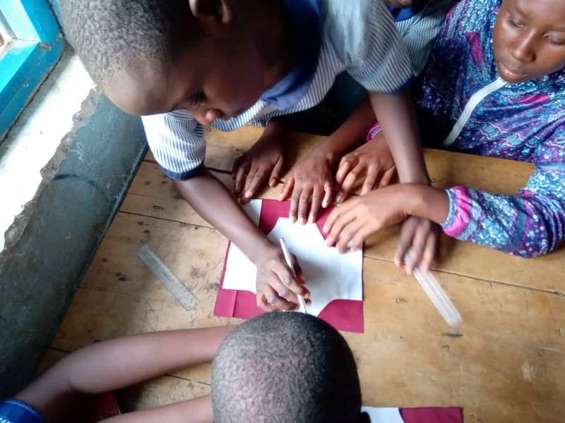 teaching the children to make pads