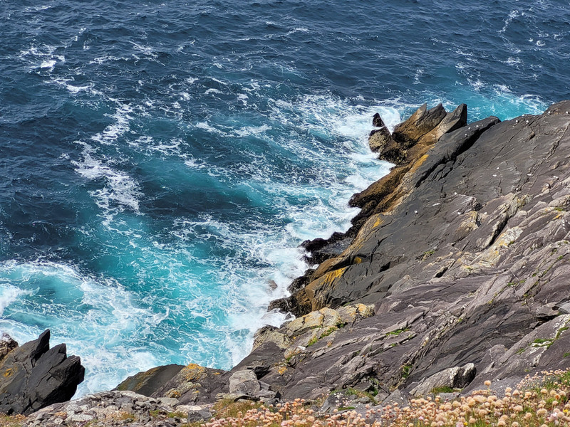 Waves versus cliff