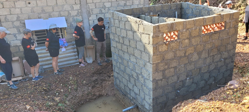 Some of the team inspecting the shower / toilet block on our first morning. 