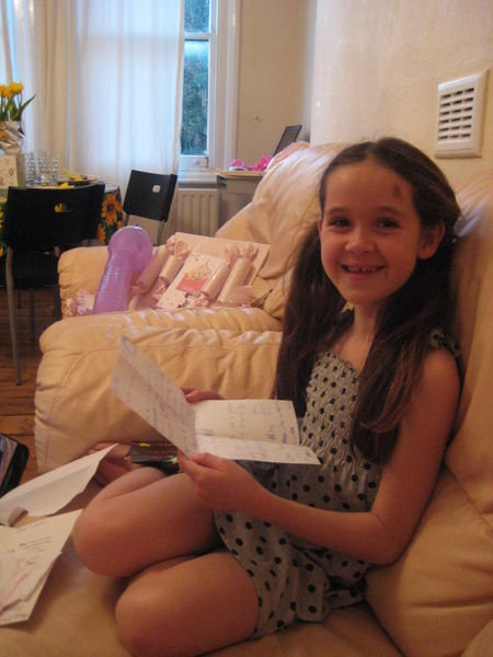 Lauren reading her birthday message from Annelise in Australia