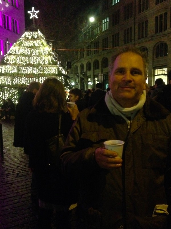 Sharing a mulled wine in Zurich in front of the "human Christmas tree'