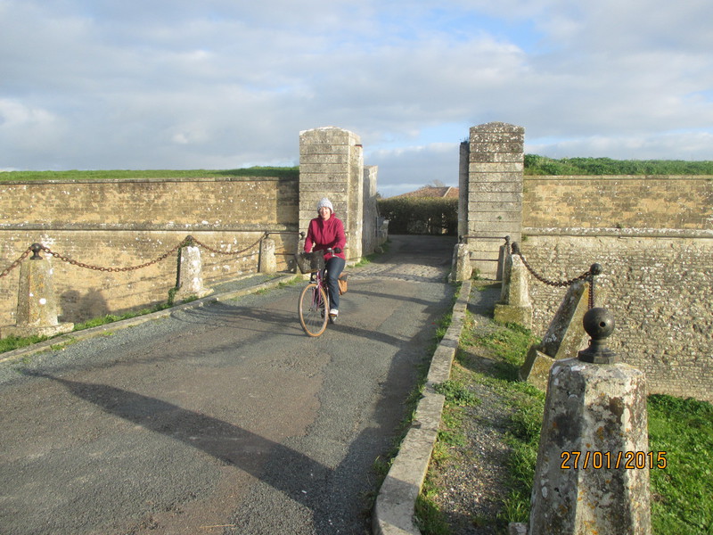 Riding through the fortified gate at St Martin (seethe mote under the bridge!)