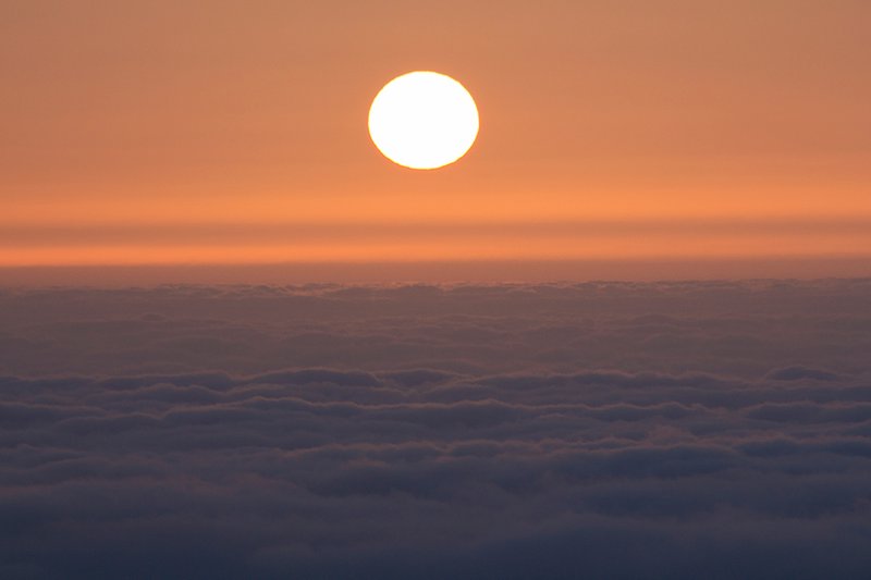 Sunset into sea of clouds