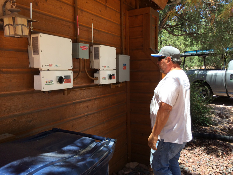 Mike turns on our new 16 KW solar system.