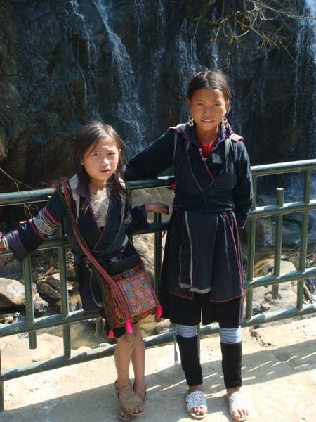 2 chatty girls by the waterfall.
