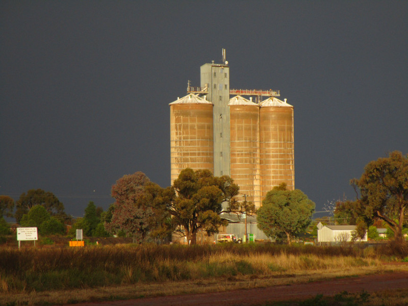 160621.10 grain silos against stormy skies