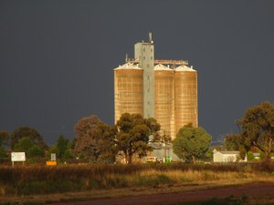 160621.10 grain silos against stormy skies