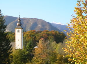 Lake Bohinj church and mountains - Slovenia