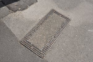 a telephone cables pavement box cover