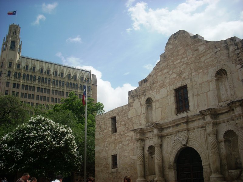 The Alamo and the Emily Morgan towering over it