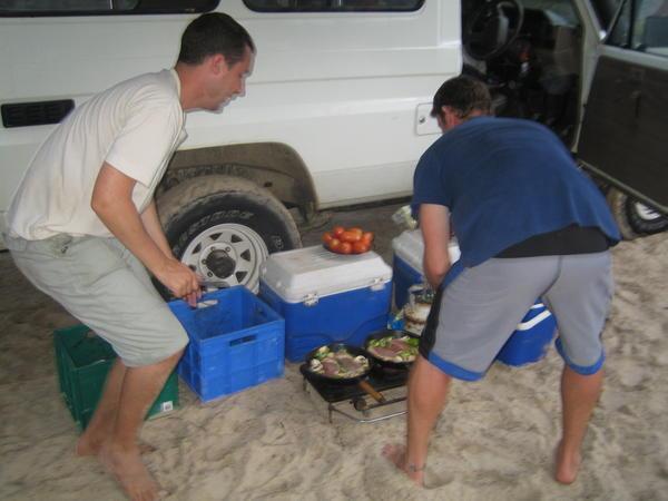 Martin & Ben cooking on the beach