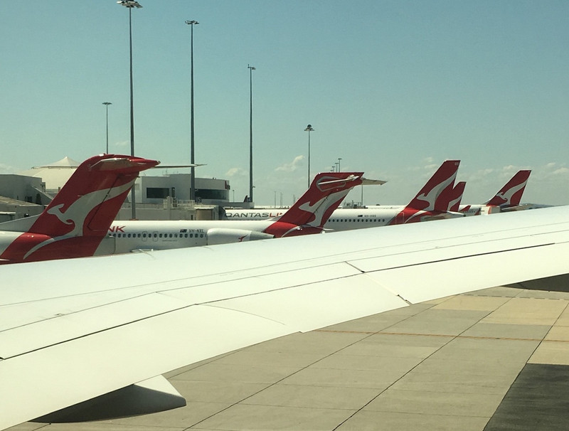 Quantas aeroplanes above the wing of the 787 Dreamliner at Perth