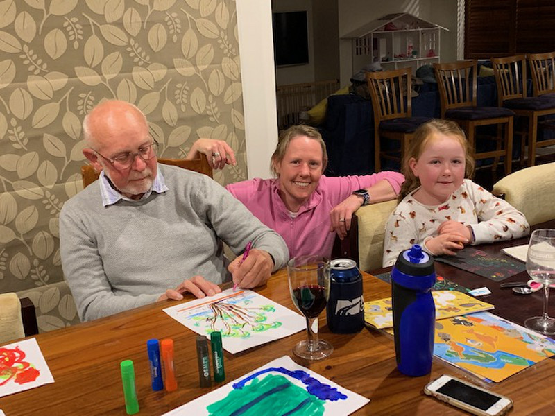Alan painting with Julie and the children