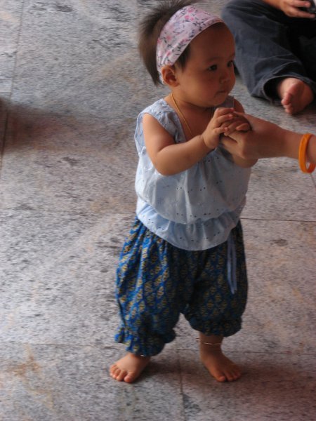 Little girl in traditional Thai costume