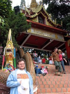 Doug in front of an entrance to Wat Doi Suthep