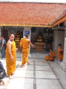Tourist monks during their picture time. Haven't seen monks do goofy posing.. i guess they're probably not supposed to.