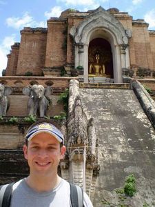Lorin in front of an old wat