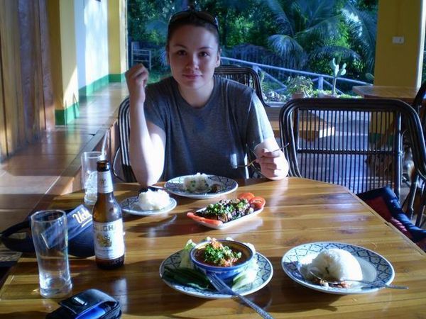 Donna eating native northern Thai food